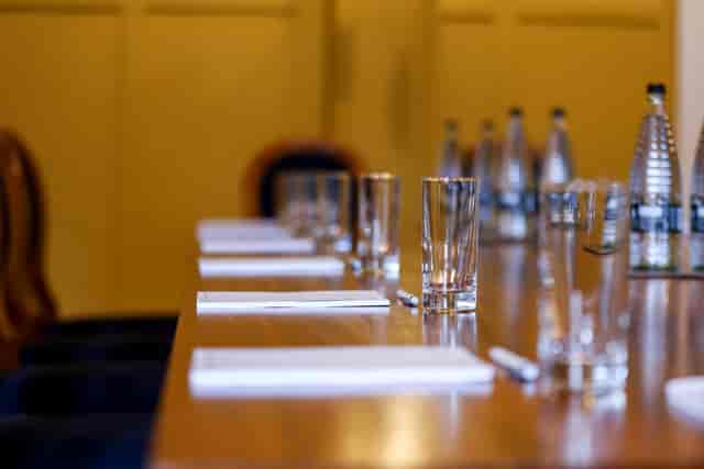 Polished wooden meeting room at HAC, ready for productive corporate discussions.