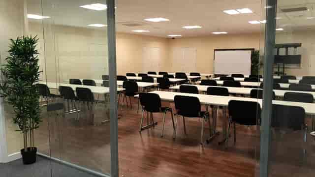 St Katherine Conference Hall with classroom layout, ideal for corporate workshops and training.