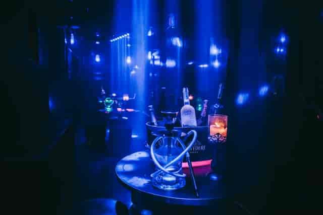 Stylish lounge area in Jako London with blue lighting, ideal for upscale cocktail receptions.
