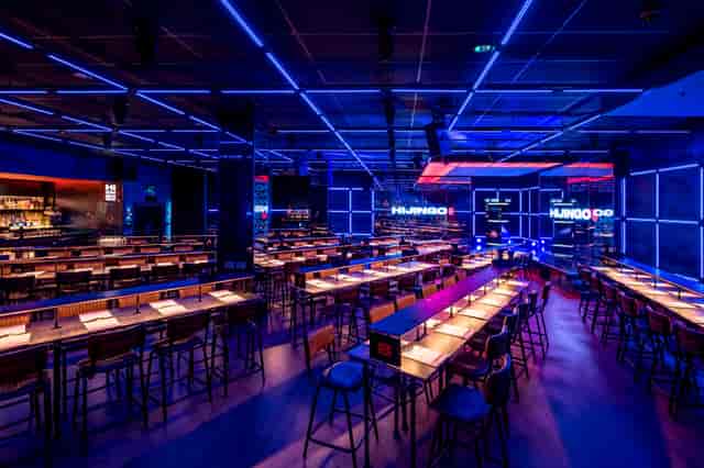 Modern event space in Hijingo with sleek seating, ideal for networking and presentations.