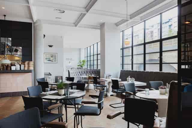 Modern venue with large windows for intimate meetings and events at No.29 Power Station West.
