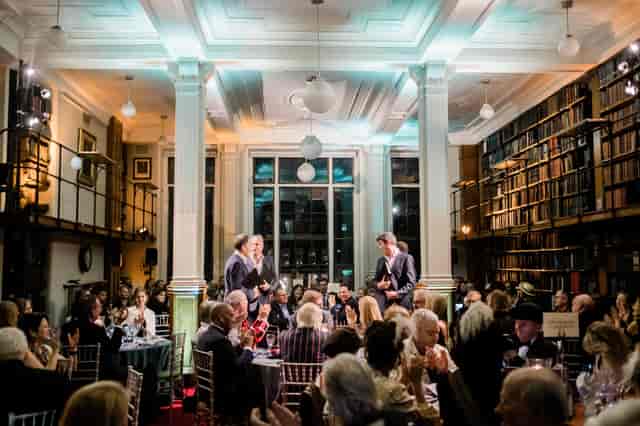 Sophisticated gala in The London Library with elegant decor, ideal for corporate events.