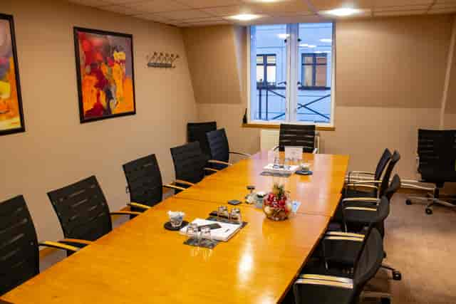 Louis Forman Room at 1 Wimpole Street, featuring a long wooden table for meetings.