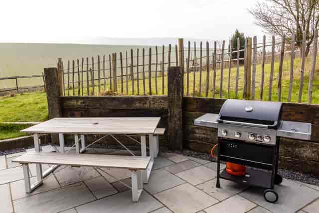 Outdoor grilling area at The Grain Store Lewes, perfect for casual events and team-building.