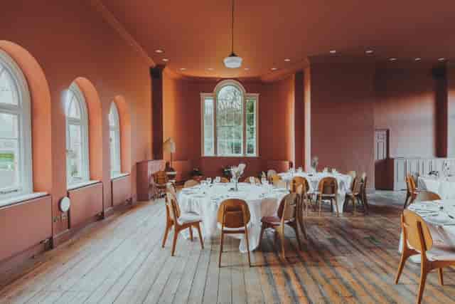 Elegant dining space with round tables, perfect for weddings and corporate events.