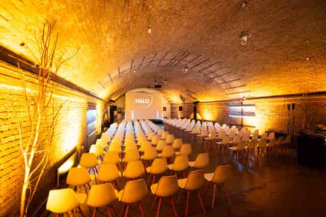 Stylish event space with modern chairs, ideal for corporate meetings and workshops.