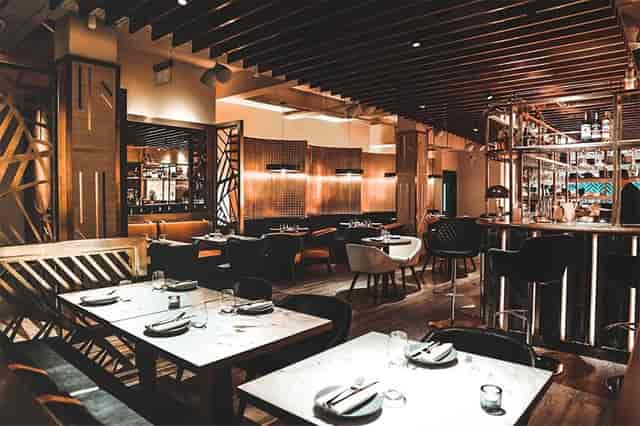 Modern restaurant interior at Farzi London, ideal for upscale events and intimate meetings.