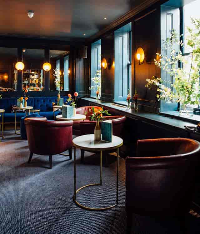 Stylish Blue Room at Quo Vadis, ideal for networking events and intimate gatherings.