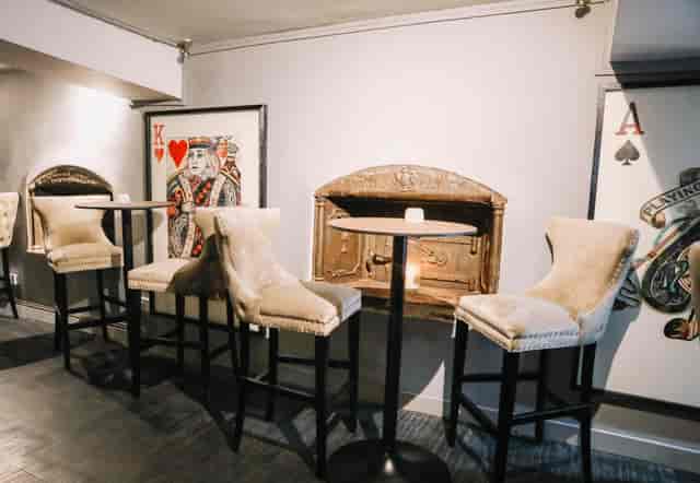Sandy's Piano Bar's stylish meeting space with plush seating for networking events.