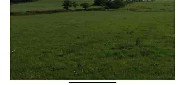 Lush green field venue in Wyresdale for outdoor events and team-building activities.