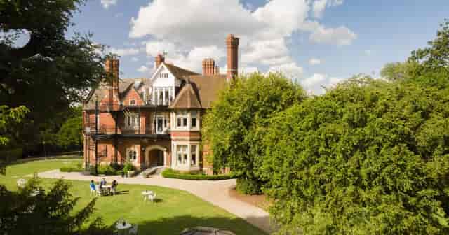 Charming Berwick Lodge mansion, ideal for outdoor corporate events and social gatherings.