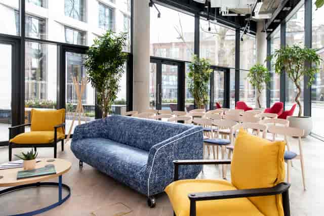 Modern event space in FORA-Southwark with vibrant seating for networking and workshops.