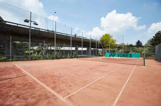 Clay tennis court at Westway Sports & Fitness Centre for outdoor events and team-building.