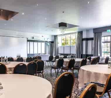 Grand Ballroom at Crowne Plaza Felbridge, elegant setup for corporate meetings and workshops.