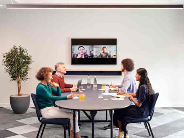 Modern hybrid meeting setup at Holiday Inn Heathrow for collaborative sessions.
