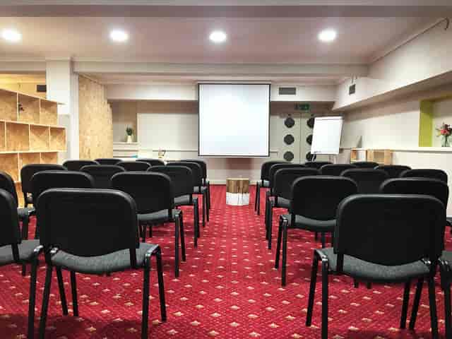 Meeting room at Ibis Styles Reading with chairs for presentations and collaboration.