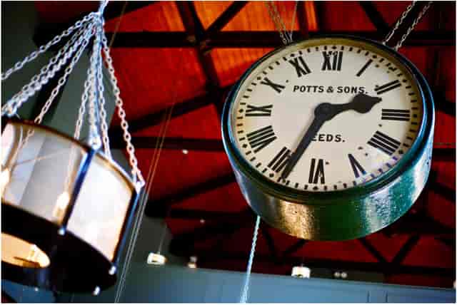 Vintage clock in The Phoenix, Denmark Hill, perfect for event planning and gatherings.