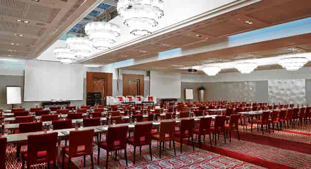 Ballroom at Palais Hansen Kempinski Vienna, elegant chandeliers, corporate events venue.