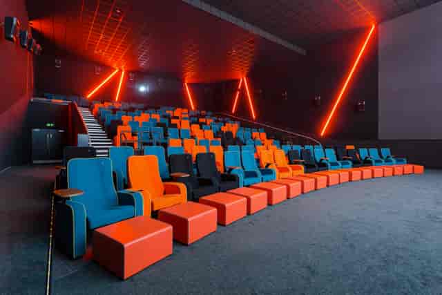 Modern auditorium with tiered seating in The Light Cinema Stockport for events and presentations.