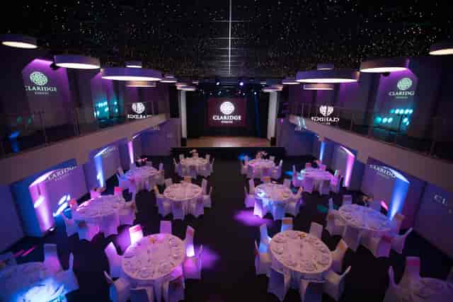 Elegant event space with round tables, ideal for upscale galas and corporate events.