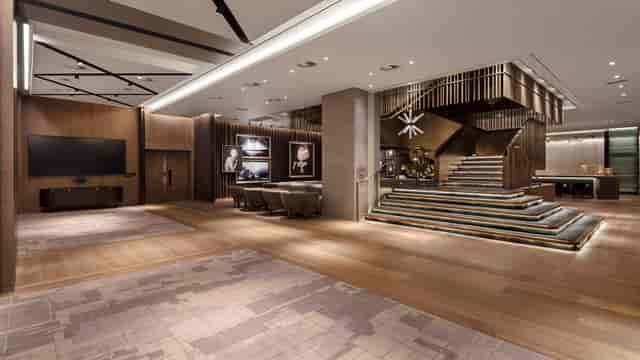 Elegant event space with striking staircase at National Gallery, ideal for meetings and gatherings.