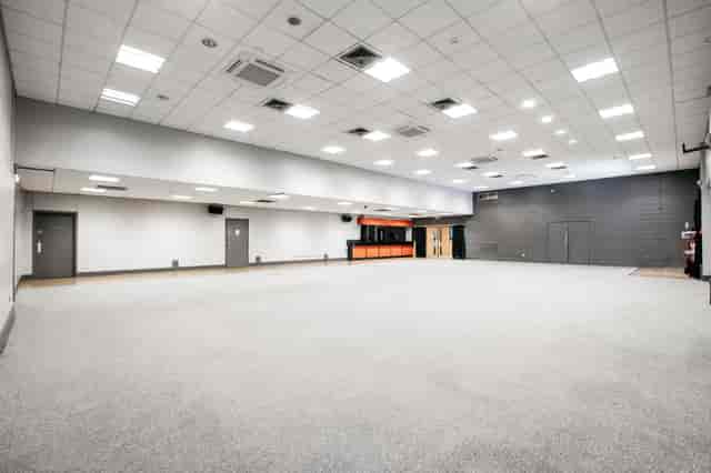 Spacious Masefield Suite venue with neutral walls, perfect for conferences and events.