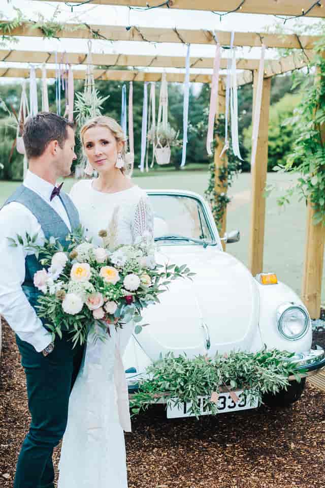 Outdoor wedding setup at Vanstone Park with a wooden arbor and elegant decor.