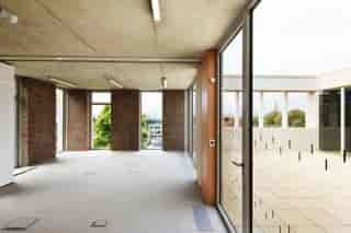 Beguine Terrace at ORTUS Venue: modern event space with large windows for meetings and gatherings.