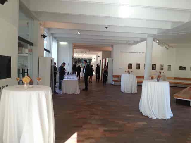 Elegant event venue with high-top tables for receptions and gatherings at Fundació Joan Miró.