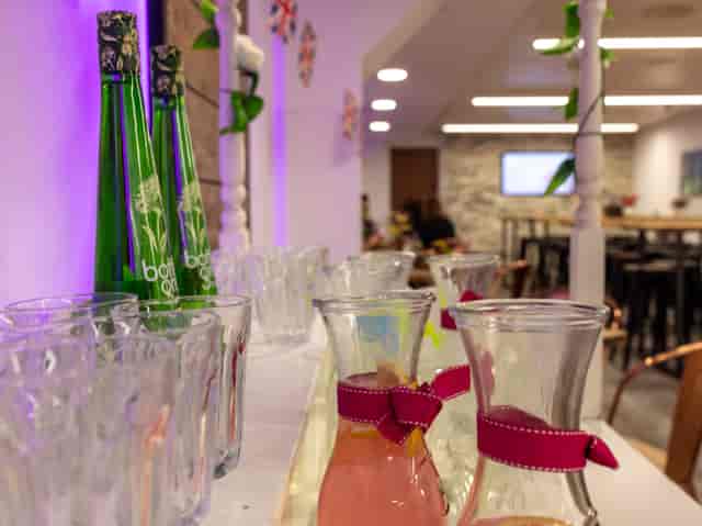 Beverage station with elegant glassware at Spitalfields, perfect for networking events.