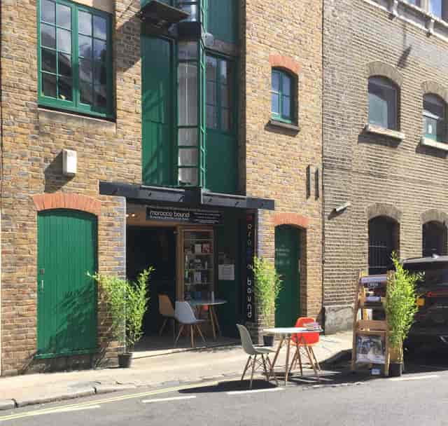 Whole Space in Morocco Bound Bookshop, rustic venue with green doors for creative workshops.