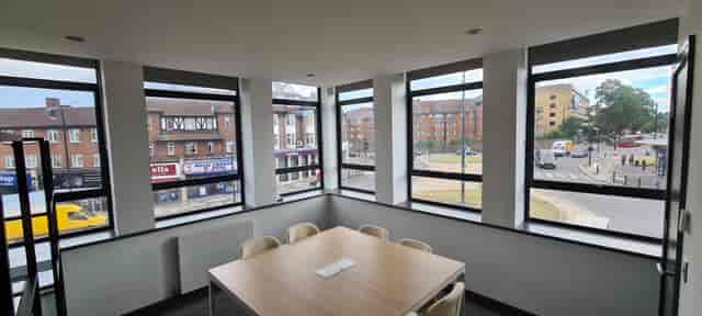 Modern Southpoint House meeting room with large windows for vibrant corporate events.
