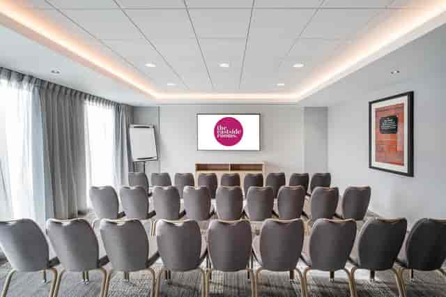 Modern Meeting Room Nine with theater seating, ideal for corporate events and workshops.