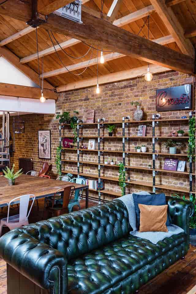 Stylish rustic meeting space in Shoreditch with exposed brick and roof terrace views.