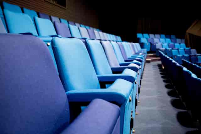 Comfortable blue seating area at West Studios, Chesterfield College for events and presentations.