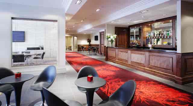 Ballroom Suite lobby at The Bristol, modern seating for events and meetings.