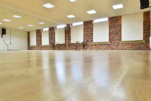 Dance Studio 2 with polished wooden floor, ideal for workshops and meetings in Leeds.