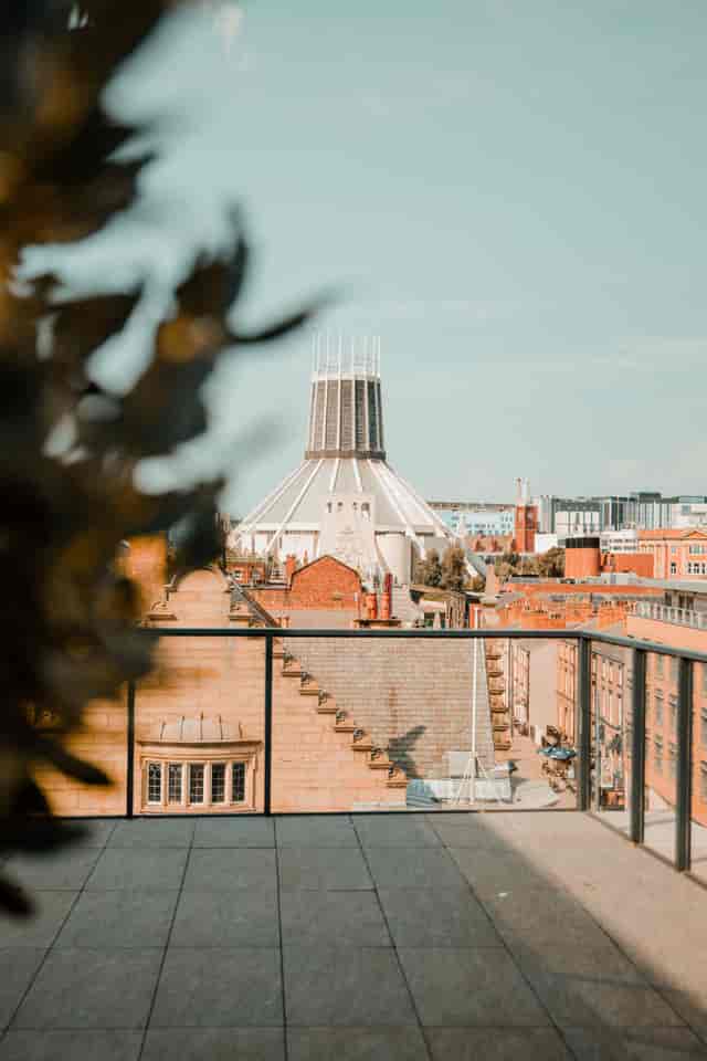 "Fifth Two rooftop at Hope Street Hotel with urban skyline, ideal for events and gatherings."