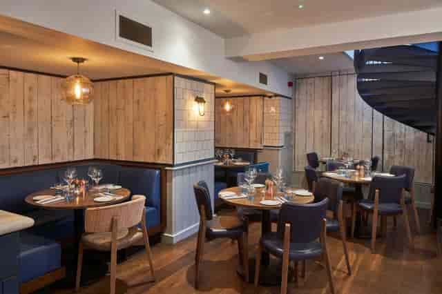 Stylish private dining at The Cove, ideal for intimate meetings and networking events.