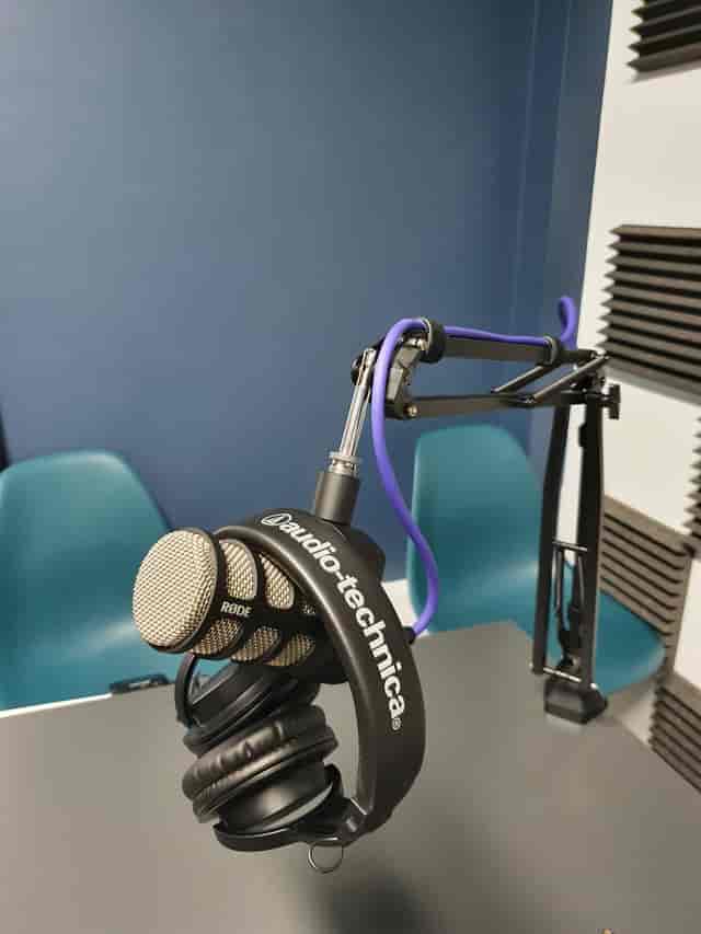 Podcast room with high-quality microphone for engaging audio recordings.