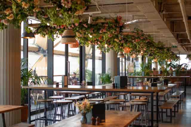 Whole Venue at Pergola on the Wharf with floral decor, ideal for networking events.