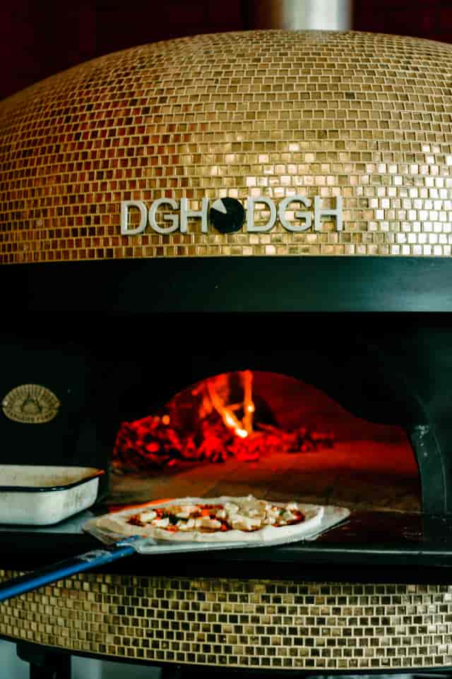Mosaic oven in Dough Dough Liverpool, perfect for culinary events and intimate dining.