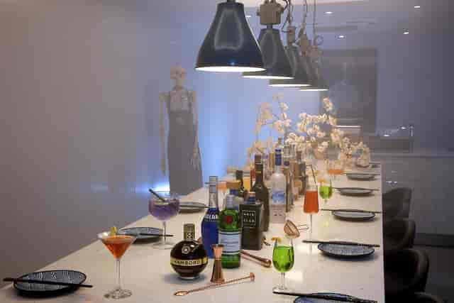 Elegant event space at Lu Ban Bar with cocktails and unique decor for gatherings.
