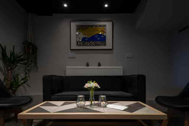 Stylish Frequency Cocktail Bar meeting space with modern furniture for intimate gatherings.