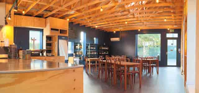 Versatile wedding venue with wooden beams and natural light in Ebury by Fat Macy's.