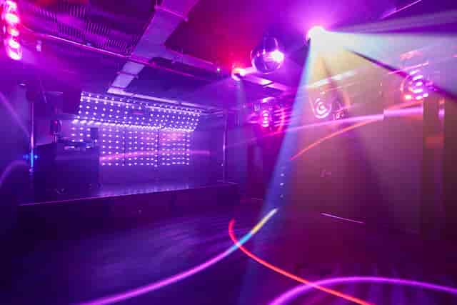 Vibrant Camden Assembly event space with colorful lighting, ideal for parties and corporate events.
