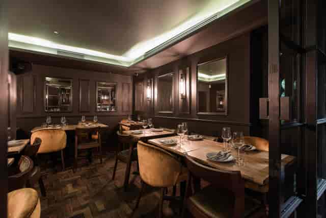 Elegant private dining room at Ember Yard, ideal for intimate gatherings and corporate dinners.