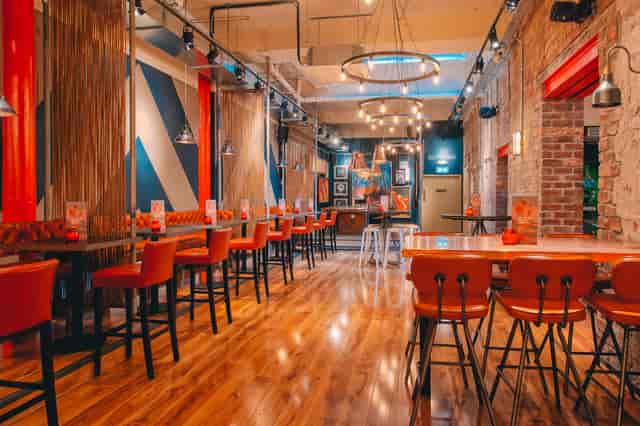 Modern event space in Revolution Mitchell Street, Glasgow with vibrant decor and flexible seating.