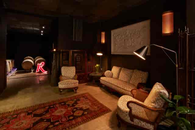 Cozy Barrel Room at London Cru Winery, perfect for intimate meetings and wine tastings.