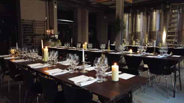 Elegant dining space at London Cru Urban Winery for intimate events and gala dinners.